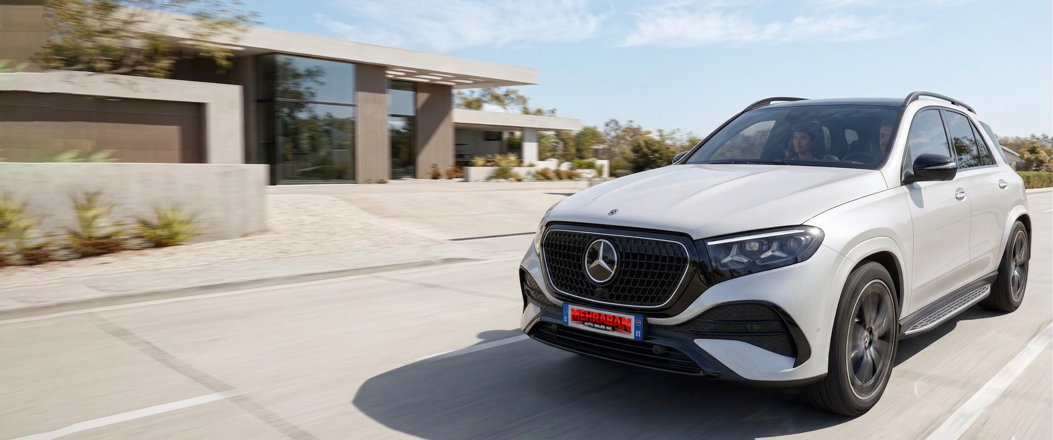 Teal electric sedan on a city street